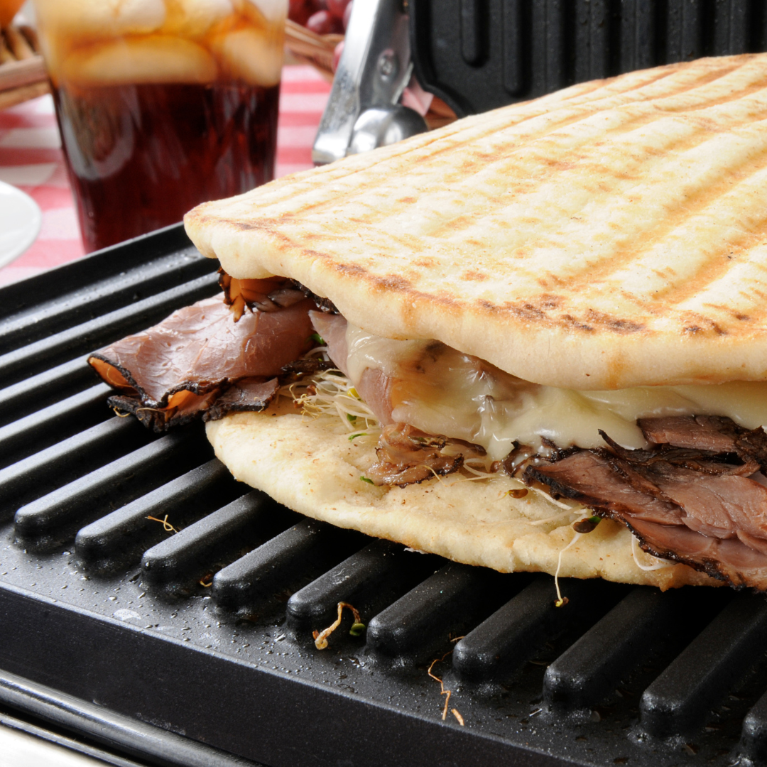 How Do I Properly Clean And Maintain A Panini Press For Making Grilled Sandwiches?