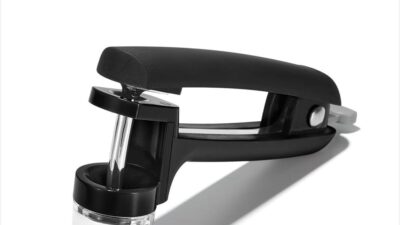 OXO Good Grips Cherry and Olive Pitter with black handle and splatter shield