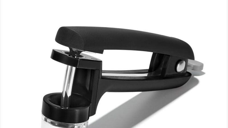 OXO Good Grips Cherry and Olive Pitter with black handle and splatter shield