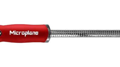 Microplane Specialty Spice Grater with a red handle and fine stainless steel rasp blade