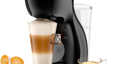 Black Nescafé Dolce Gusto Piccolo XS capsule coffee machine with a latte and an espresso