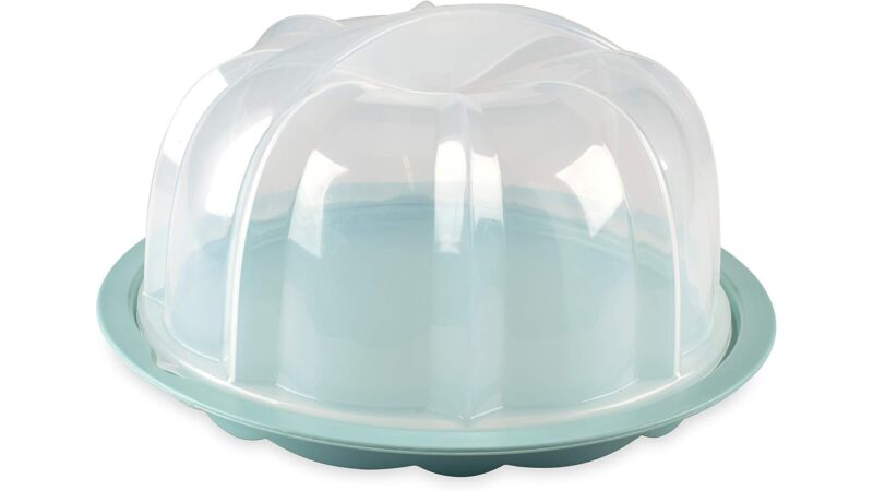 Nordic Ware translucent Bundt cake keeper with a clear fluted dome on a sea glass green base