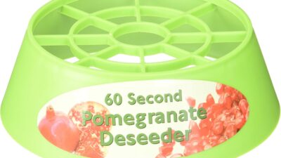 Green Seed Out 60 Second Pomegranate Deseeder ring with a grid top
