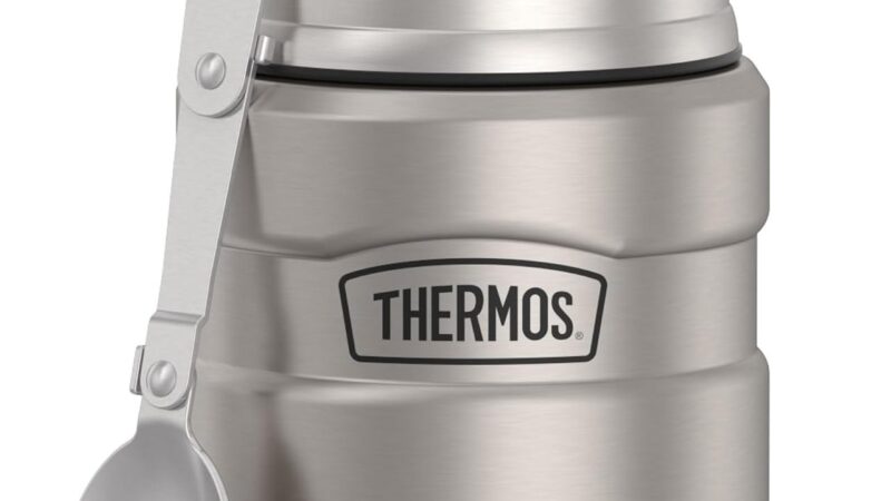 Thermos Stainless King 16oz food jar in matte steel with a folding spoon clipped to the side